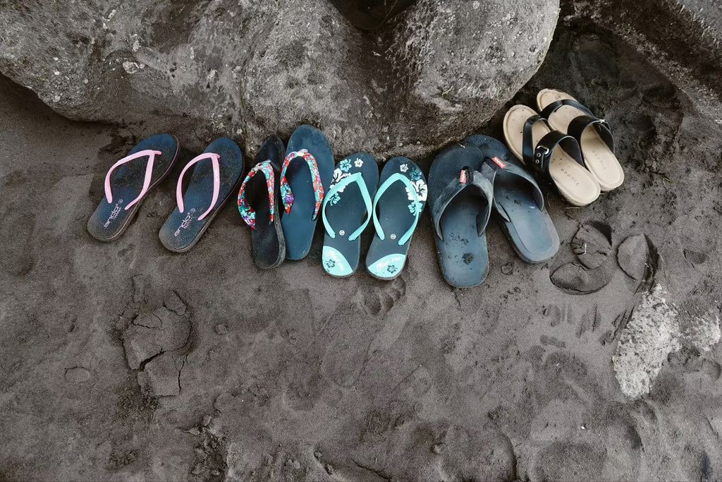 Discover stylish and colorful beach flip-flops and sandals, ideal for vacations, beach outings, and summer fun. Lightweight and comfortable footwear for sandy adventures and seaside relaxation.