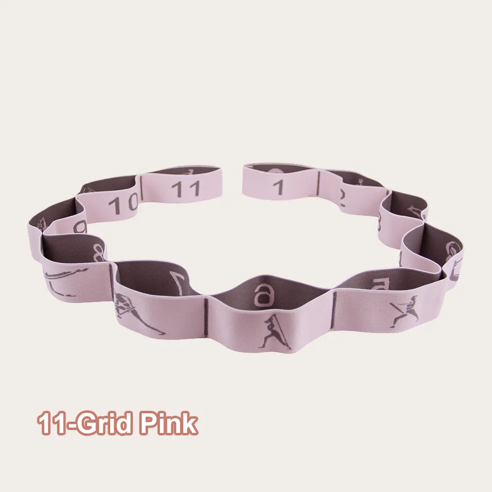 A soft pink version of the 11-grid yoga strap, perfect for ballet, yoga, and physiotherapy routines. Made from durable elastic fabric with clear numerical markings for easy adjustment.