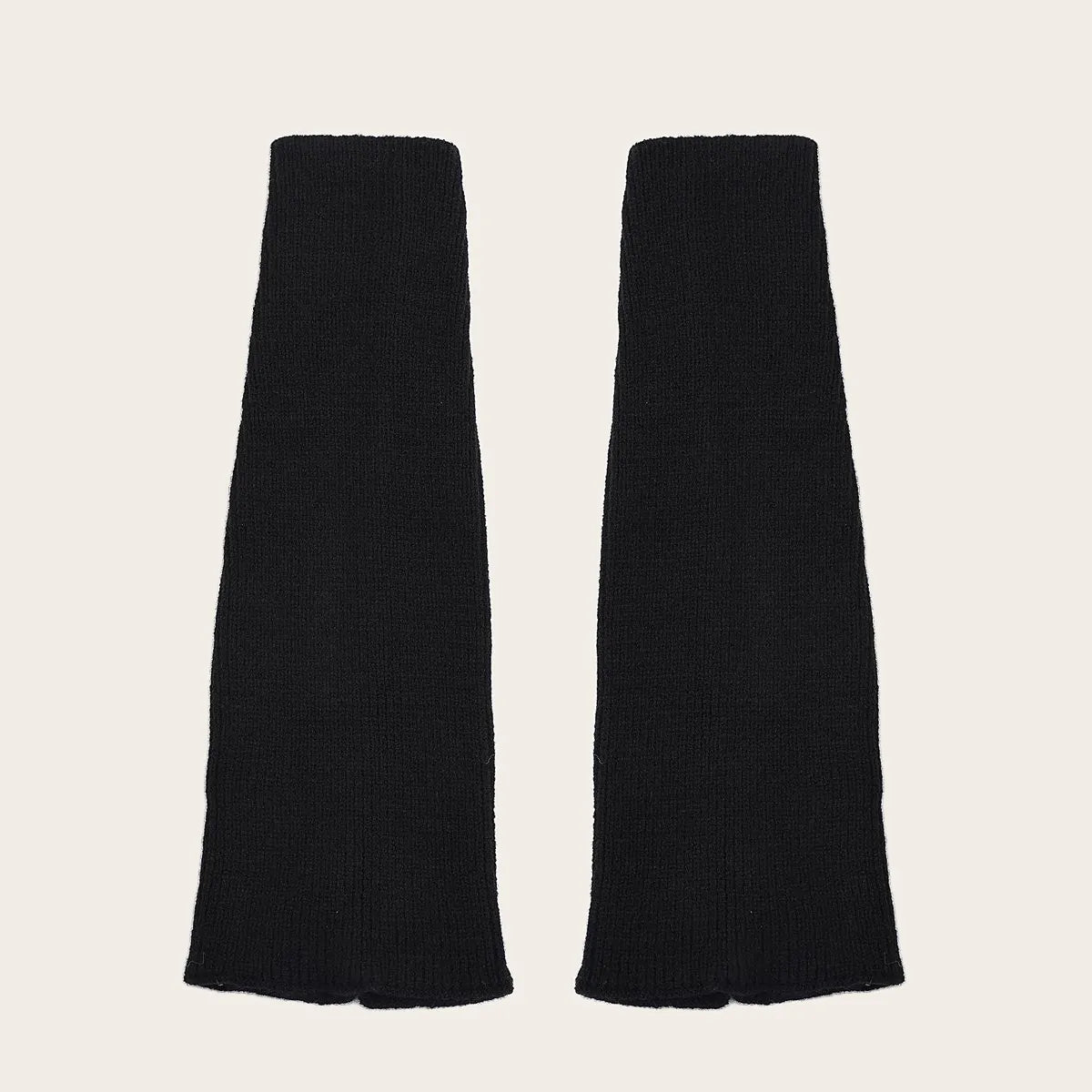 Classic black over-the-knee knit leg warmers – essential winter accessory for women.