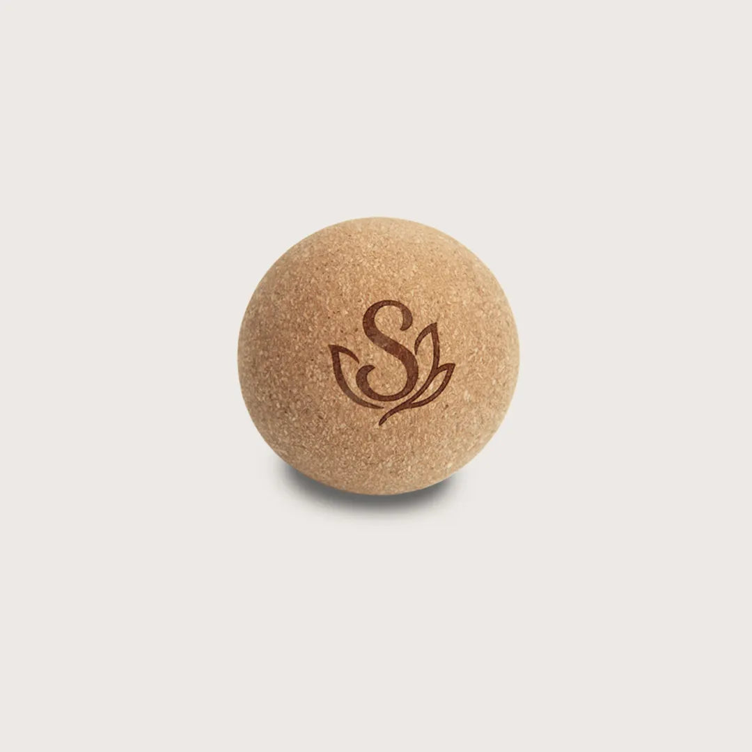 Minimalist image of a cork massage ball used for deep tissue massage, foot massage, and muscle tension relief. Perfect for gym users and wellness enthusiasts.