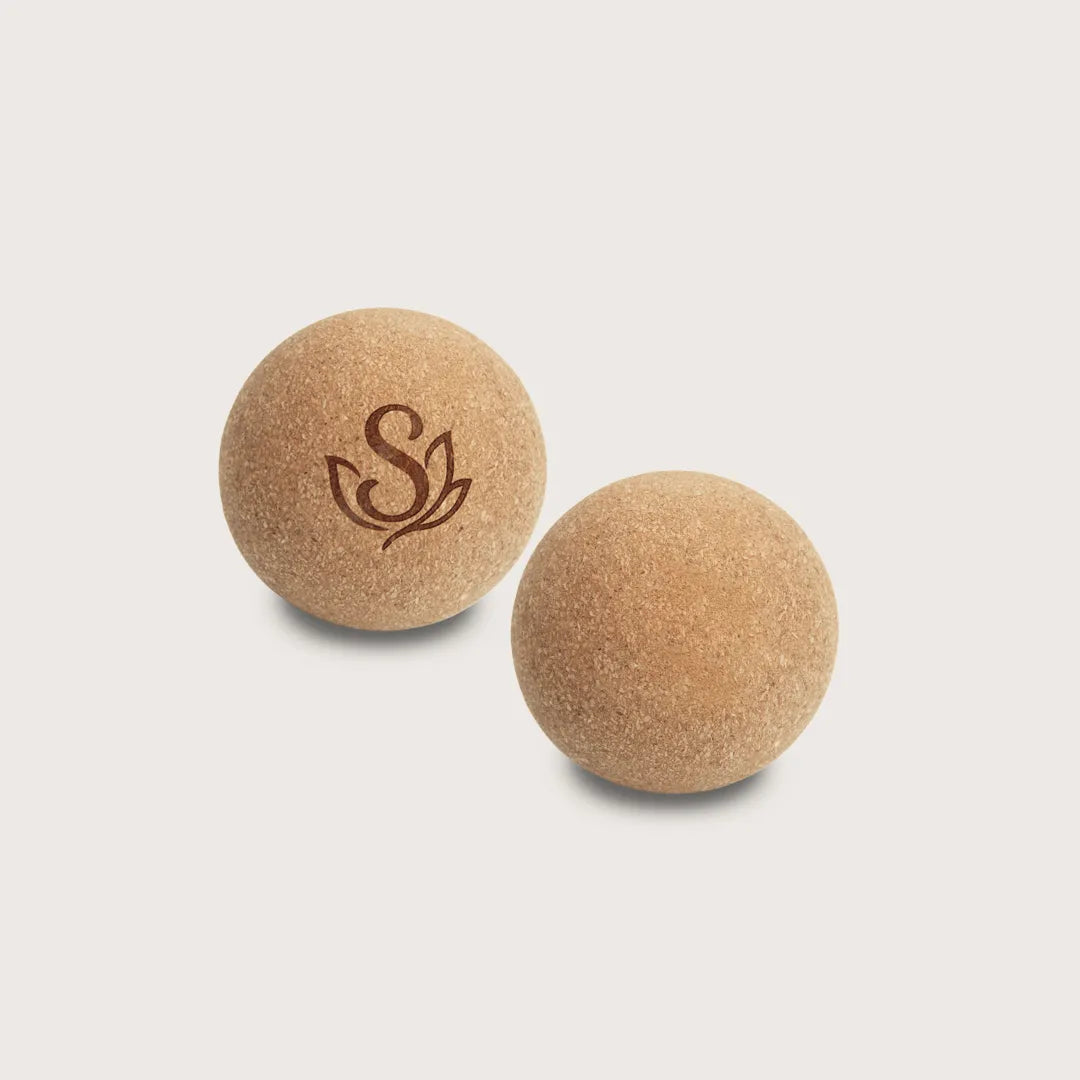 A set of two eco-friendly cork massage balls ideal for deep tissue massage, back pain relief, and trigger point therapy. Perfect for yoga, pilates, and home workouts.