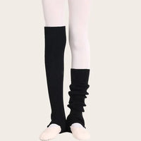 Black over-the-knee stirrup leg warmers made of soft ribbed fabric, great for dance, pilates, and yoga.