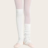 White stirrup leg warmers with breathable ribbed knit design, ideal for pilates and barre classes.
