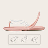 Pink foldable yoga slippers with a demonstration of how they fold for easy storage and portability. Perfect for yoga and casual wear.