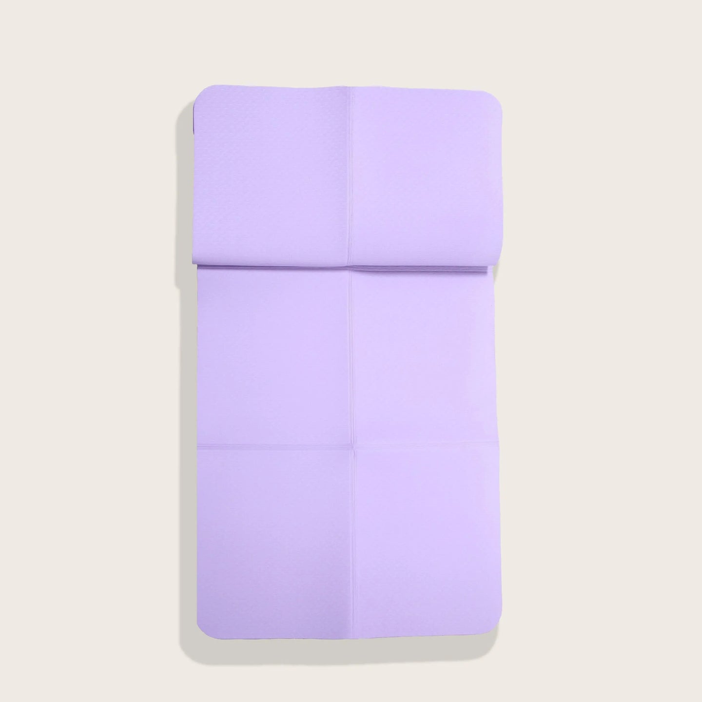 Purple foldable TPE yoga mat from Sportive Lives, eco-friendly and portable, ideal for yoga enthusiasts in Canada. Easy to fold and store.