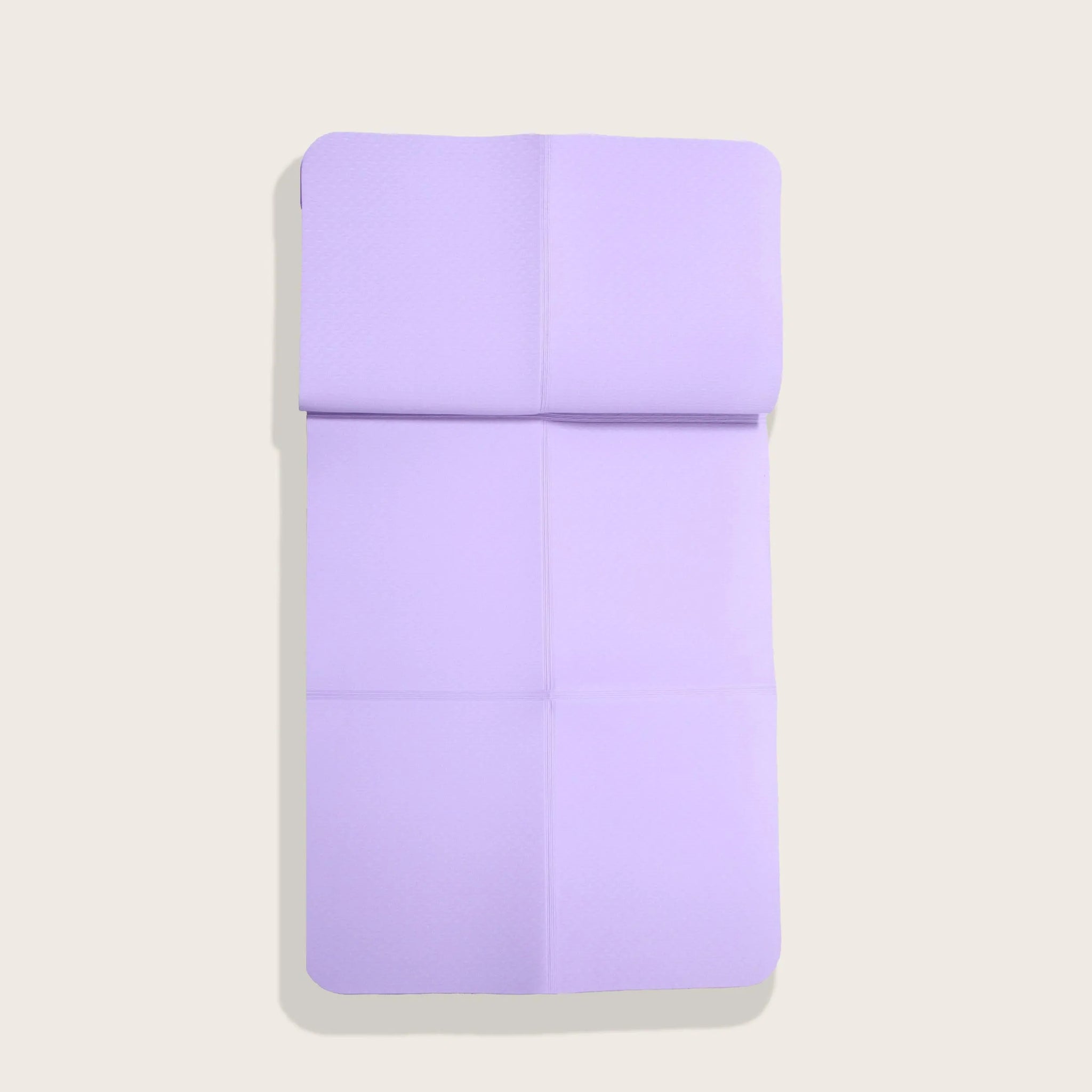 Purple foldable TPE yoga mat from Sportive Lives, eco-friendly and portable, ideal for yoga enthusiasts in Canada. Easy to fold and store.