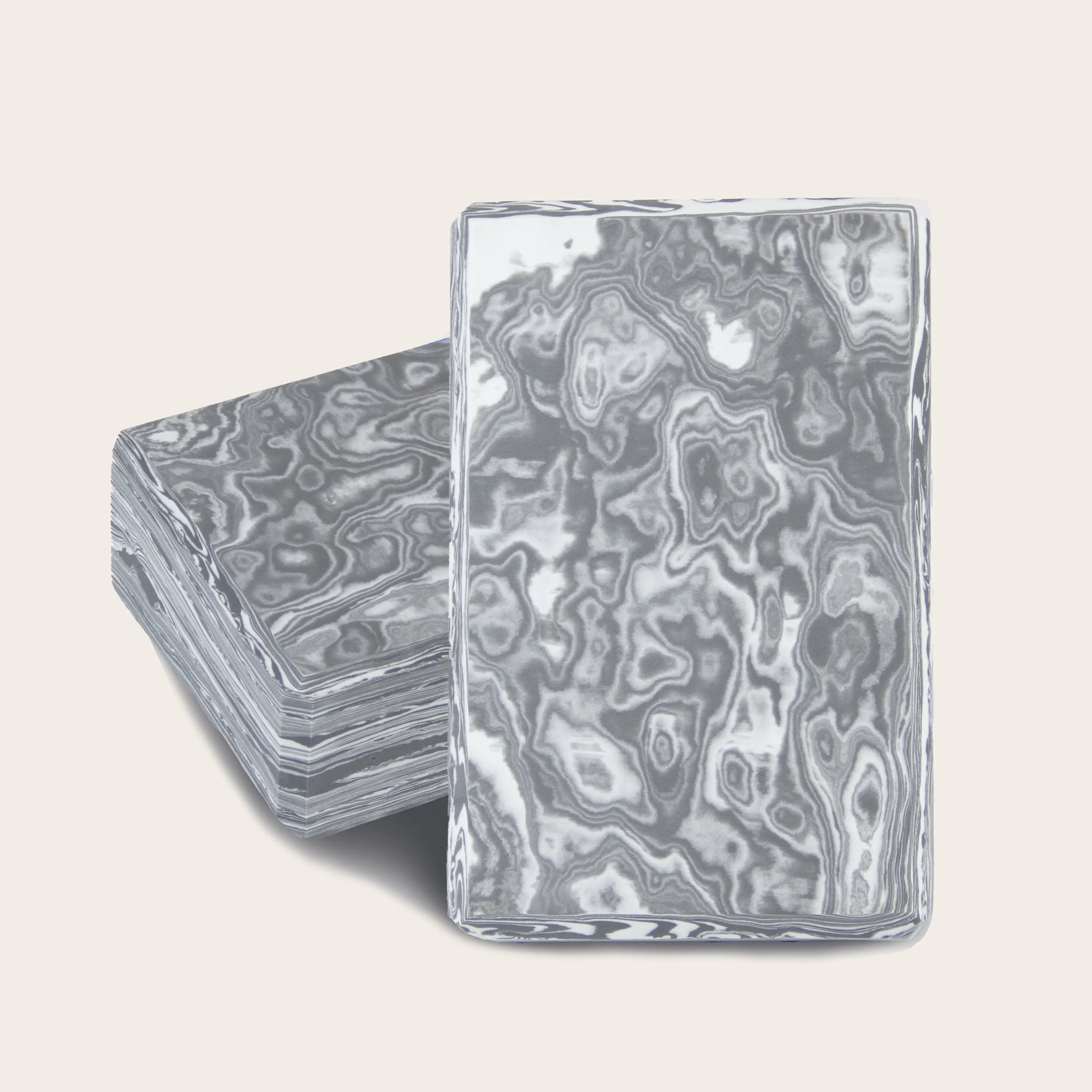 French grey yoga block with high-density EVA foam. Ideal for beginner and advanced yogis, providing firm support and balance.