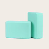 Mint green Yoga Block PURE, eco-friendly EVA foam, offering excellent support and balance for yoga practice. Suitable for various yoga poses.