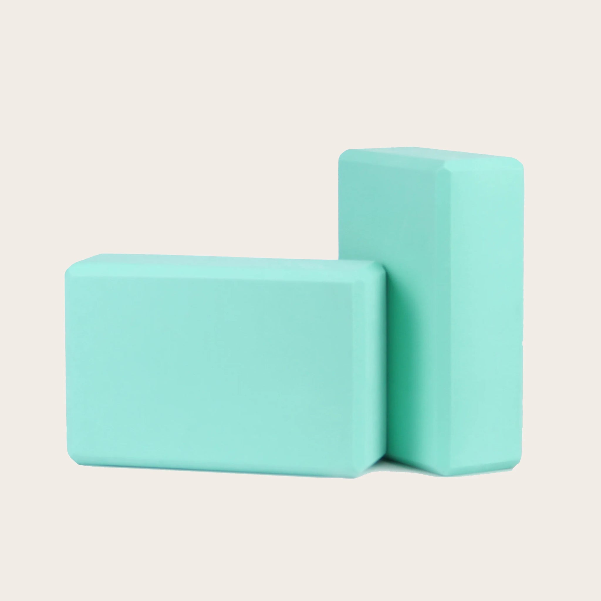Mint green Yoga Block PURE, eco-friendly EVA foam, offering excellent support and balance for yoga practice. Suitable for various yoga poses.