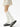Off-white ribbed knit leg warmers with sneakers; slouchy fit and feminine lace-trim skirt for everyday layering.