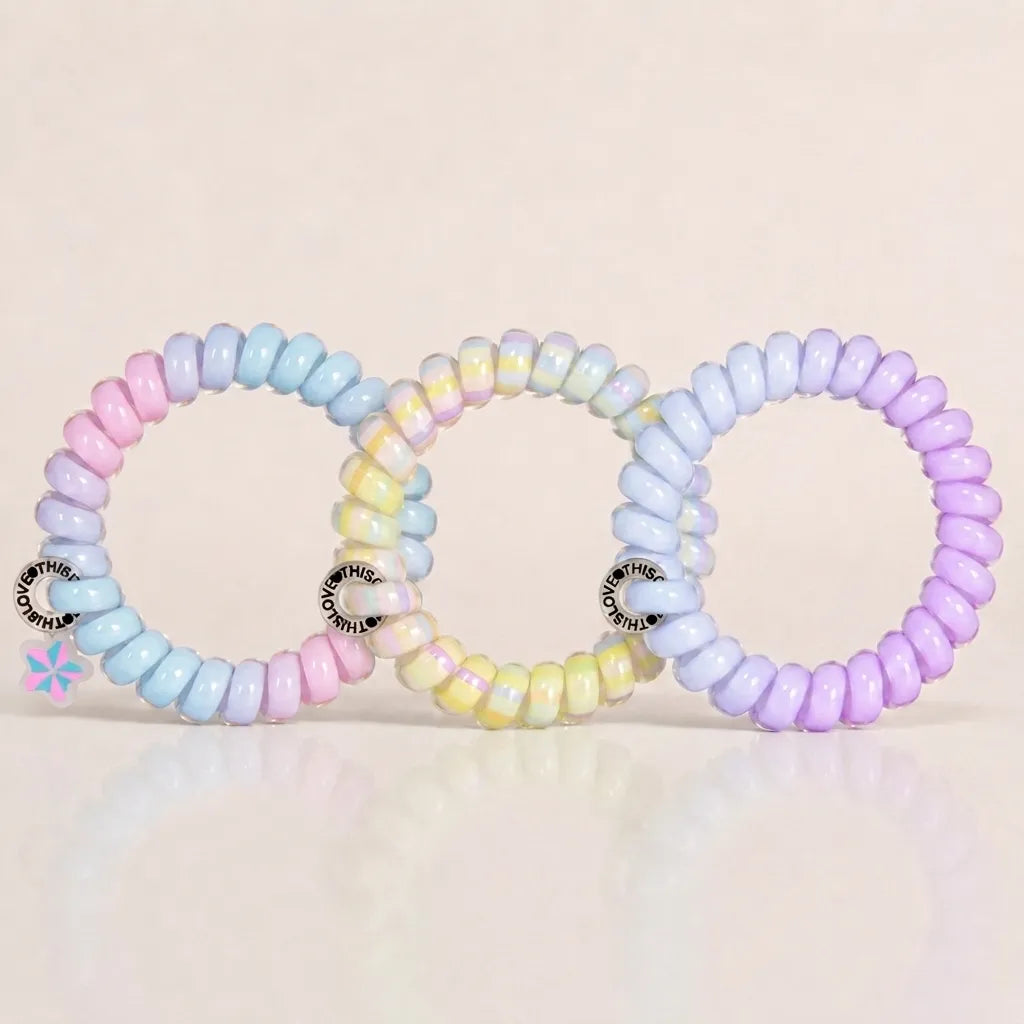 Set of 3 Jelly Spiral Hair Ties in pastel purple, blue and multicolour designs with a glossy coil finish.
