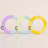 Set of 3 Jelly Spiral Hair Ties in pastel purple, mint green and yellow colour combinations for everyday ponytails.