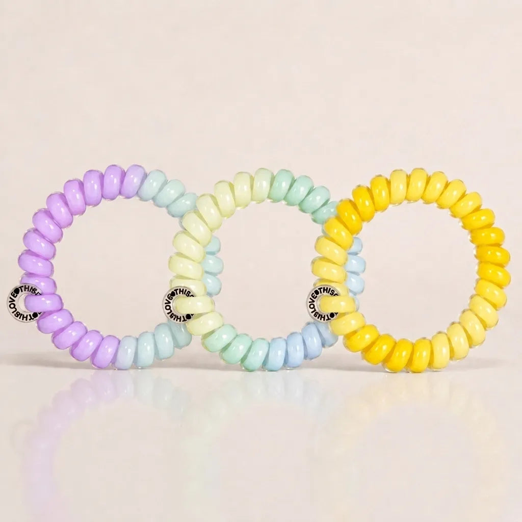 Set of 3 Jelly Spiral Hair Ties in pastel purple, mint green and yellow colour combinations for everyday ponytails.