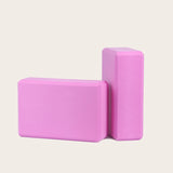 Pink Yoga Block PURE, made of high-density EVA foam, eco-friendly, perfect for stability in yoga practice. Ideal for yoga beginners and professionals.