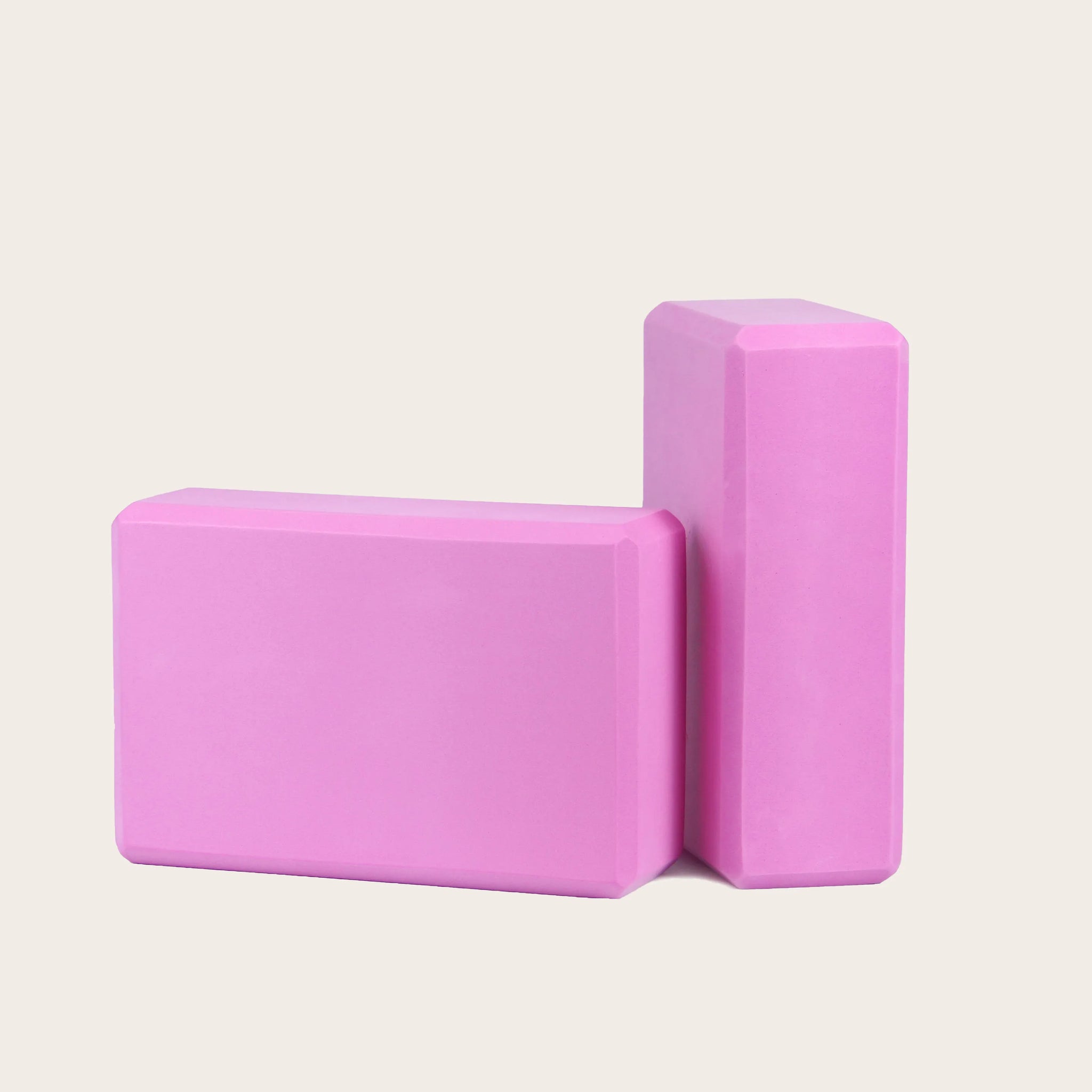 Pink Yoga Block PURE, made of high-density EVA foam, eco-friendly, perfect for stability in yoga practice. Ideal for yoga beginners and professionals.