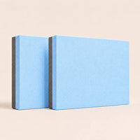 Light blue Sportive Lives TPE yoga balance pad with charcoal bottom layer and textured foam surface for stretching, balance exercises and fitness training.