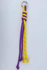 Sportive Lives braided rope bag charm keychain in Purple & Yellow, Heart Clip—bright paracord-style bag charm for fanny packs, backpacks and keys, Canada.