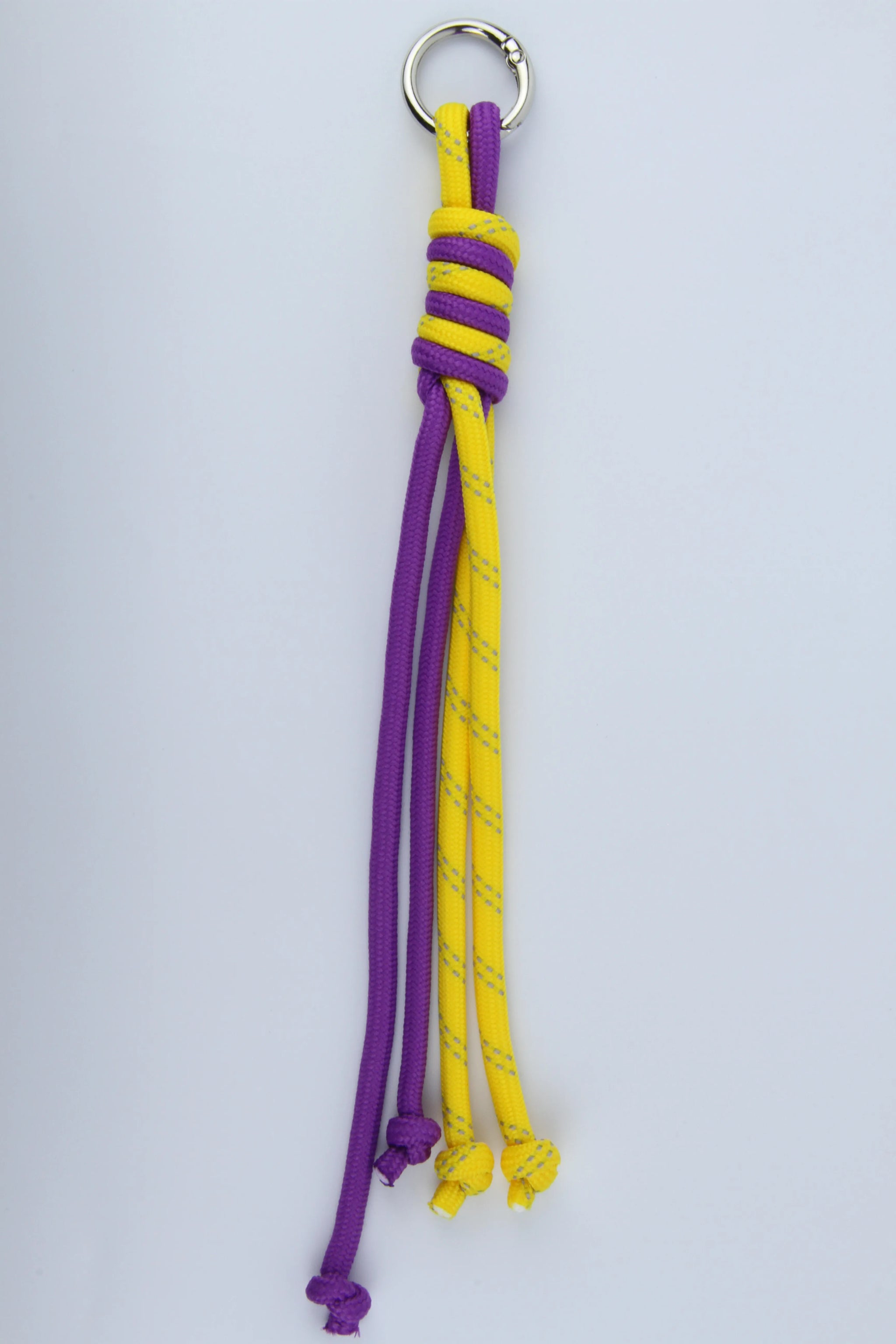 Sportive Lives braided rope bag charm keychain in Purple & Yellow, Heart Clip—bright paracord-style bag charm for fanny packs, backpacks and keys, Canada.