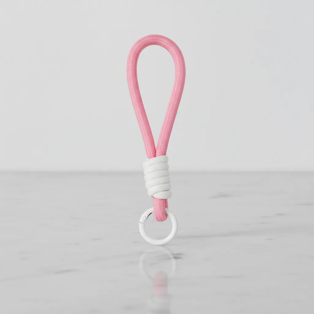 Baby pink braided rope charm with white wrap and ring—clip-on mug handle loop and purse keychain, soft grip, giftable; Sportive Lives Canada.