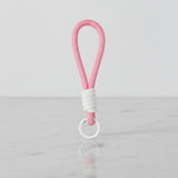 Baby pink braided rope charm with white wrap and ring—clip-on mug handle loop and purse keychain, soft grip, giftable; Sportive Lives Canada.