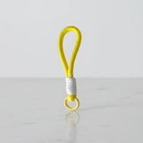 Lemon yellow braided rope charm with white wrap—cup handle loop & keychain, Canada.
