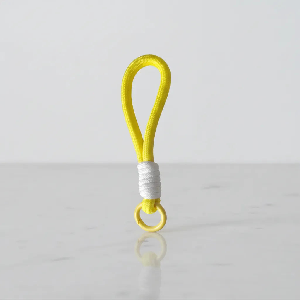 Lemon yellow braided rope charm with white wrap—cup handle loop & keychain, Canada.