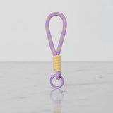 Lilac rope charm with butter wrap and ring—clip-on handle/keychain by Sportive Lives, Canada.