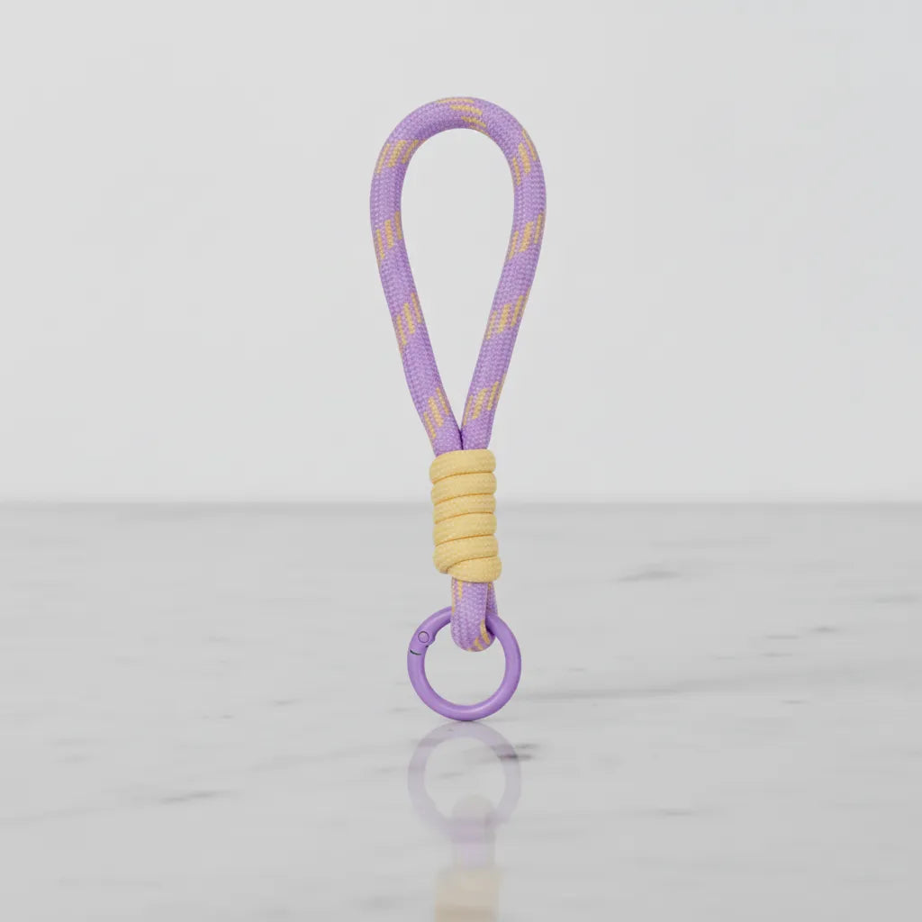 Lilac rope charm with butter wrap and ring—clip-on handle/keychain by Sportive Lives, Canada.