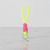 Neon yellow rope charm with pink wrap and green quick-clip ring—mini cup handle / key ring by Sportive Lives, colourful accessory for mugs, bottles, totes, Canada.