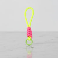 Neon yellow rope charm with pink wrap and green quick-clip ring—mini cup handle / key ring by Sportive Lives, colourful accessory for mugs, bottles, totes, Canada.