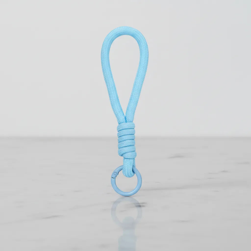 Sky-blue braided rope charm with matching wrap and ring—quick-clip mug handle loop / key ring, minimal and durable; Sportive Lives accessories in Canada.