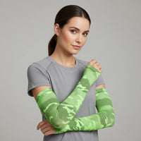 Model wearing green camo UV arm sleeves; cooling, breathable sun sleeves with secure fit — Sportive Lives Canada