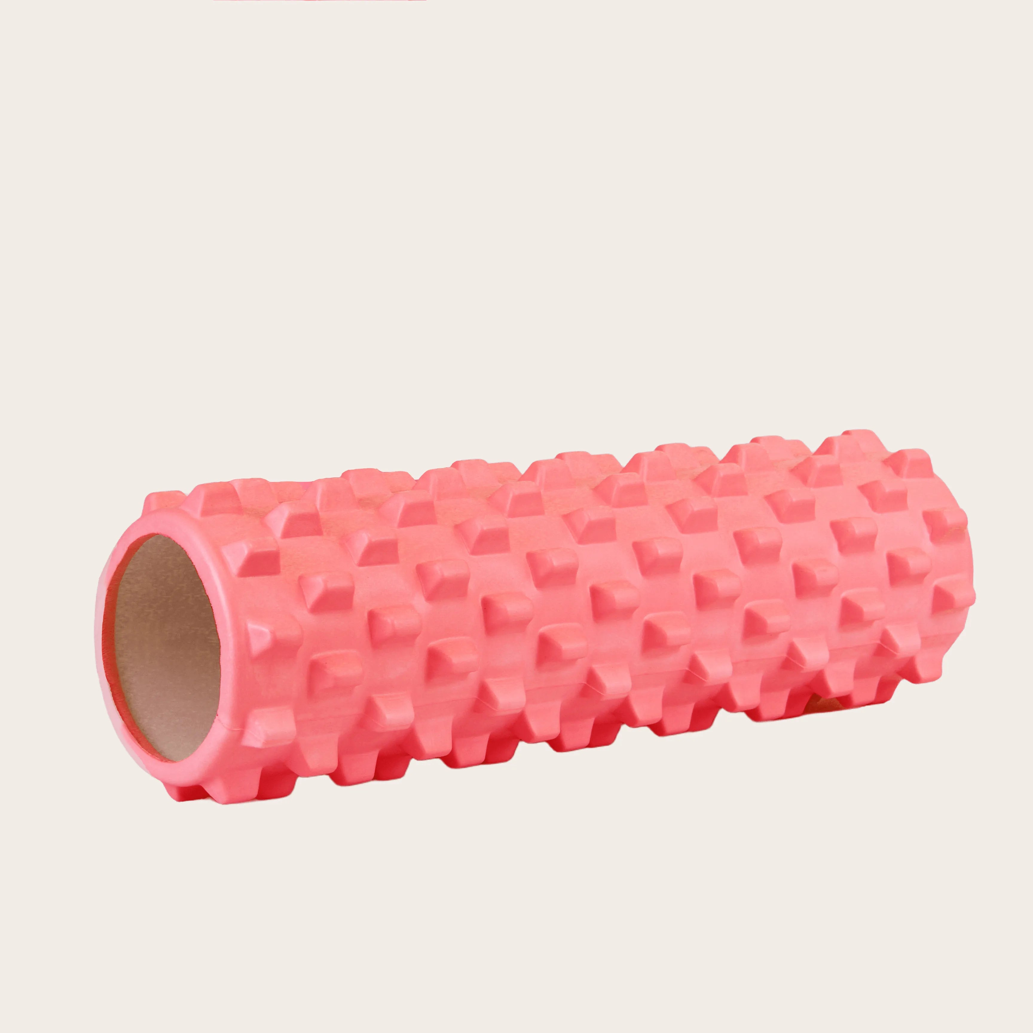 Coral red EVA massage roller from Sportive Lives with grid surface for targeted relief and muscle relaxation, suitable for gym and home in Canada