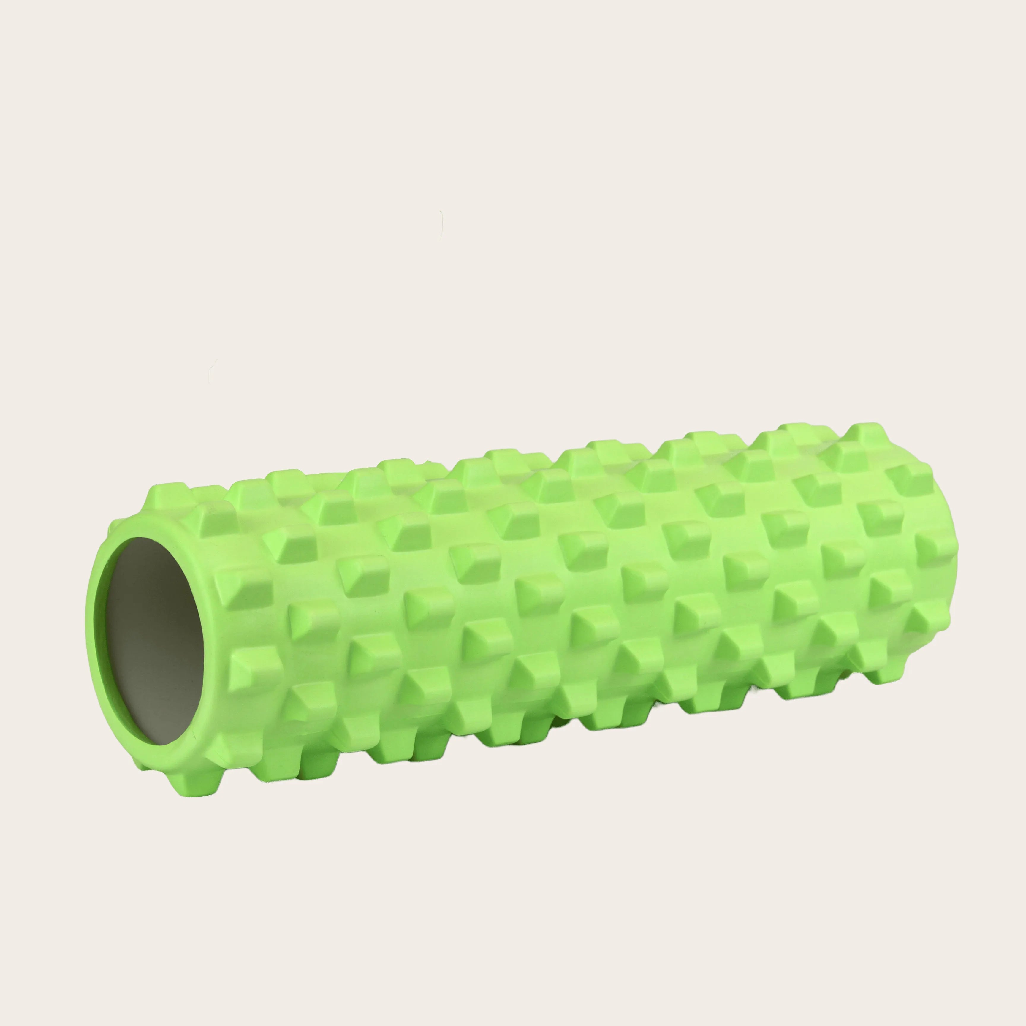 Green EVA foam roller from Sportive Lives featuring high-density spikes for full body yoga and athletic recovery in Canada