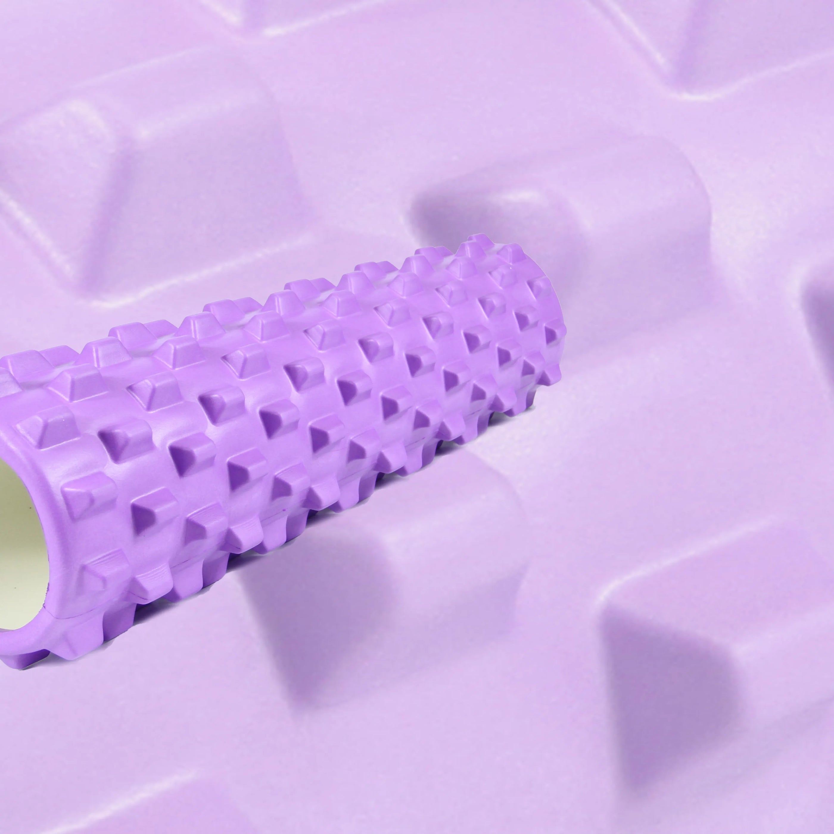 Sportive Lives purple EVA Massage Roller PRO with textured surface for deep tissue massage and muscle recovery, ideal for yoga and fitness in Canada.