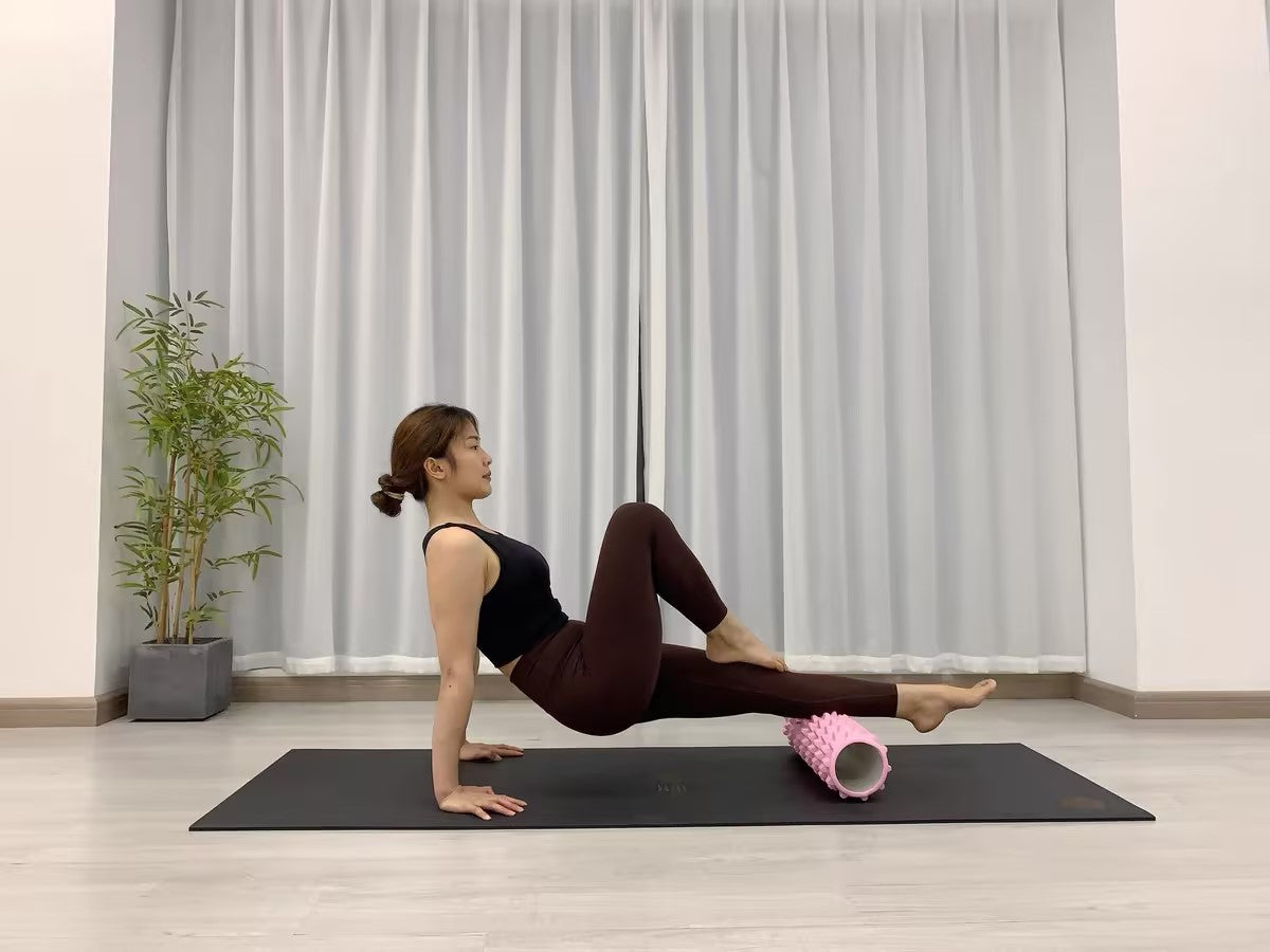 Leg workout with the Sportive Lives EVA Foam Roller to target deep tissue massage. Best for muscle recovery and flexibility in yoga or fitness routines, available in Canada.