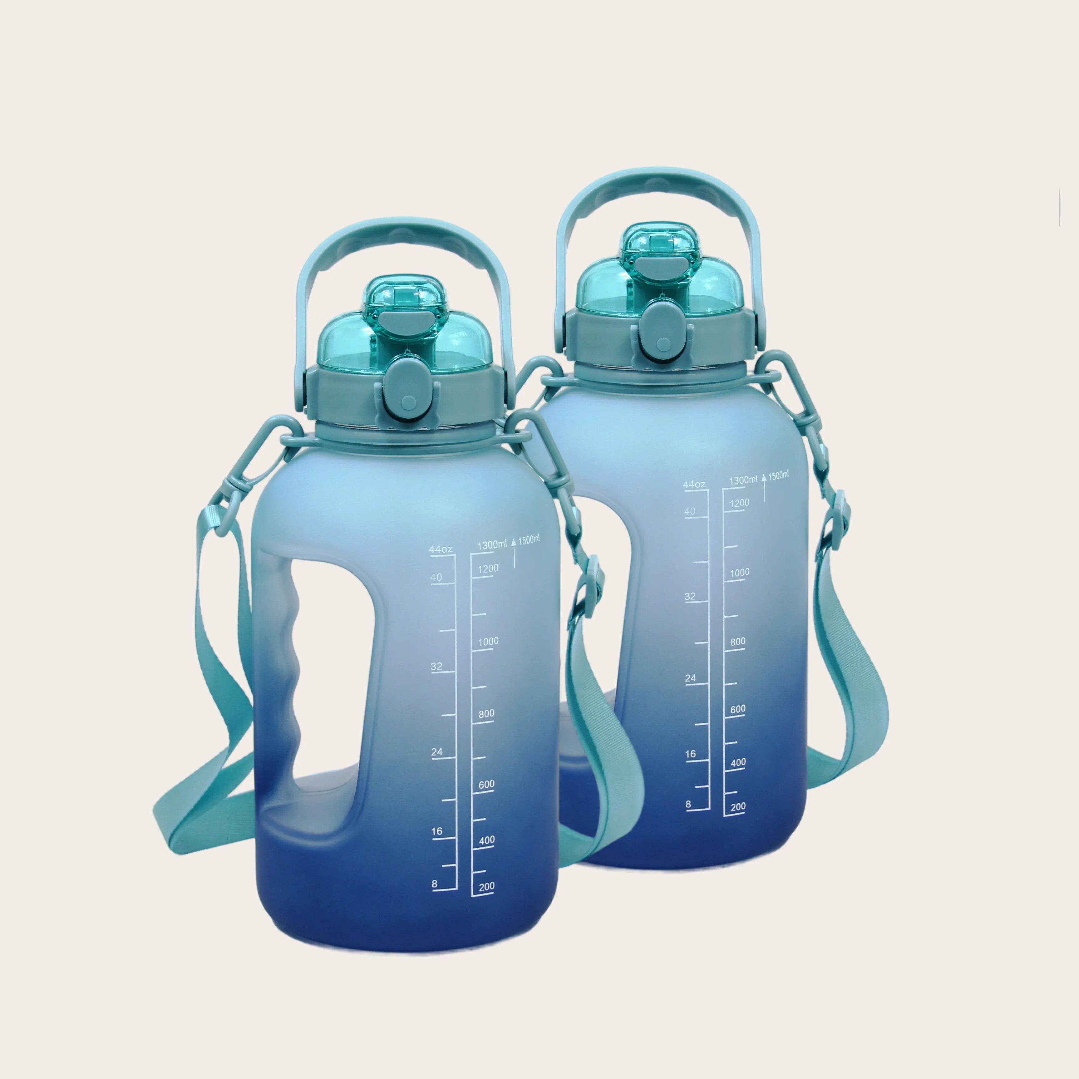 Two Sportive Lives 1500ml gym bottles in navy blue gradient with measurement markings, leak-proof lid, and shoulder strap for fitness in Canada