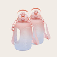 Two Sportive Lives 1.5L gym water bottles in salmon and white gradient with handle and straw, ideal for fitness hydration in Canada