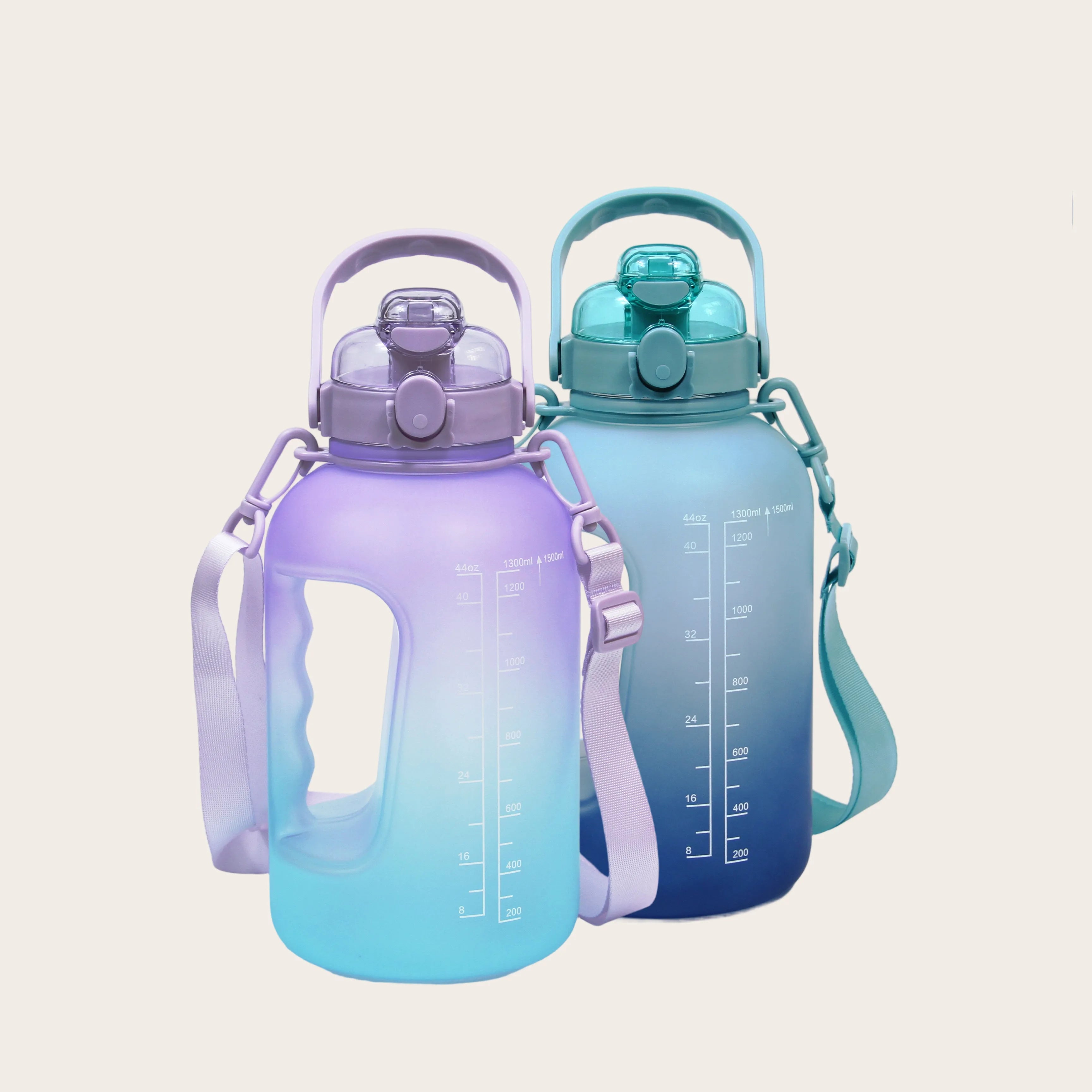 Set of Sportive Lives 1.5L gym water bottles in purple cyan and navy blue gradient colors, featuring time markers, straw lid, and ergonomic handle, designed for hydration on the go in Canada