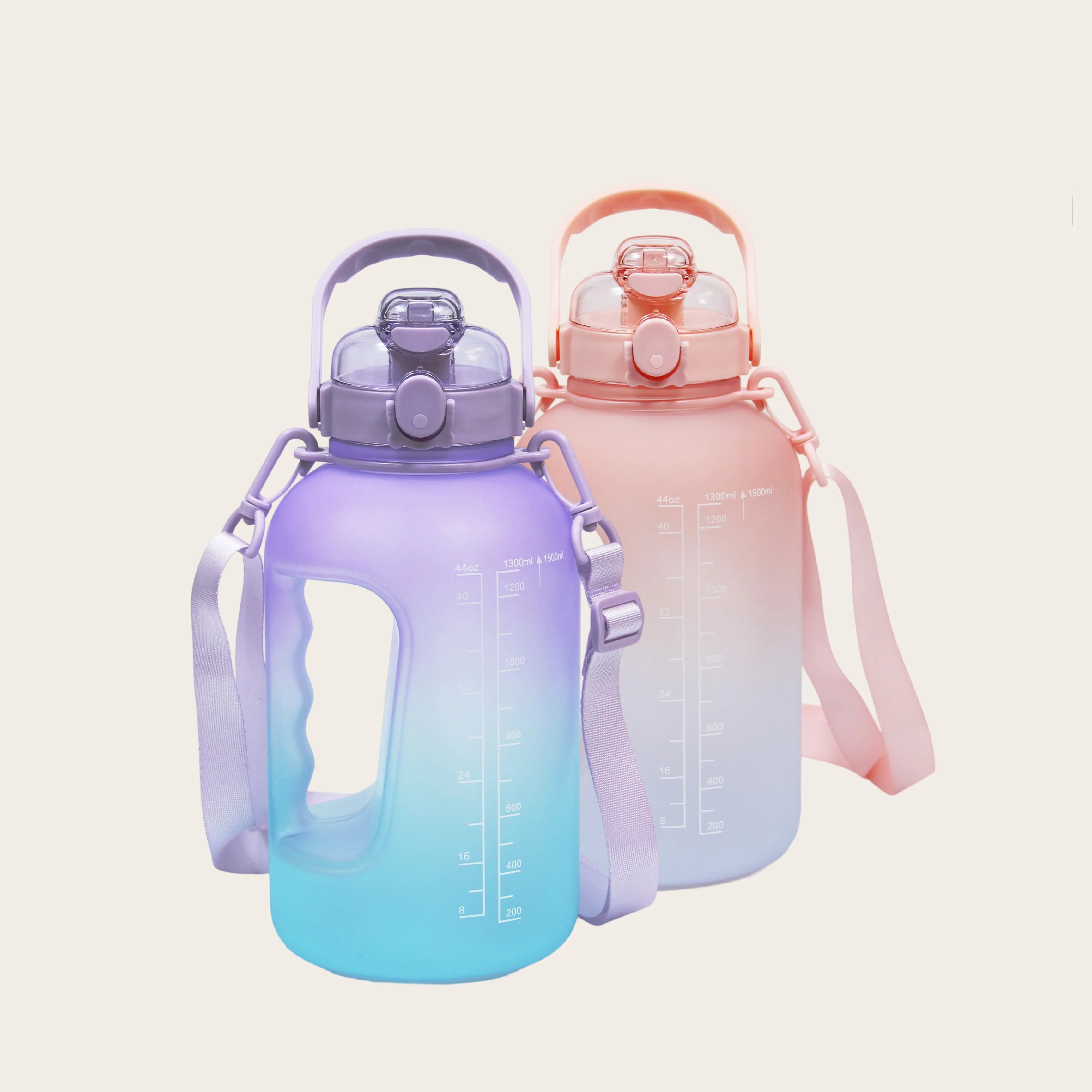 Set of two Sportive Lives GYM Bottle P150 in purple-cyan and salmon-white gradients, 1.5L water bottles with ergonomic grip and time marker, Canada
