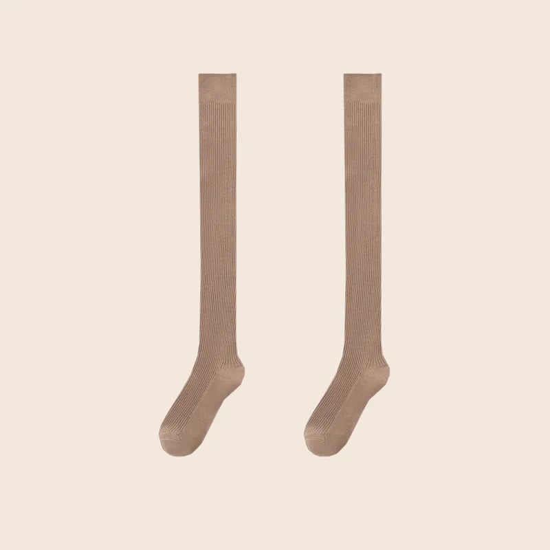 Pair of khaki Sportive Lives knee-high socks in minimalist design, crafted from soft, breathable cotton-blend fabric.
