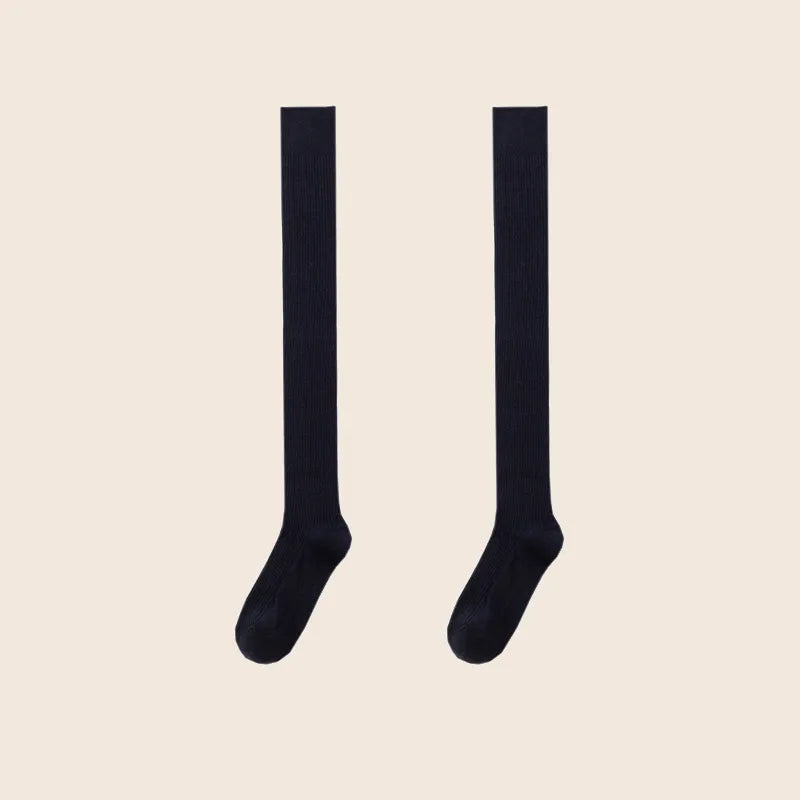 Elegant navy blue Sportive Lives knee-high socks, perfect for casual outfits or yoga practice.