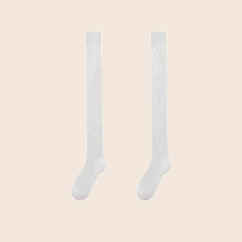 Pair of white Sportive Lives knee-high socks featuring minimalist design, great for everyday wear.
