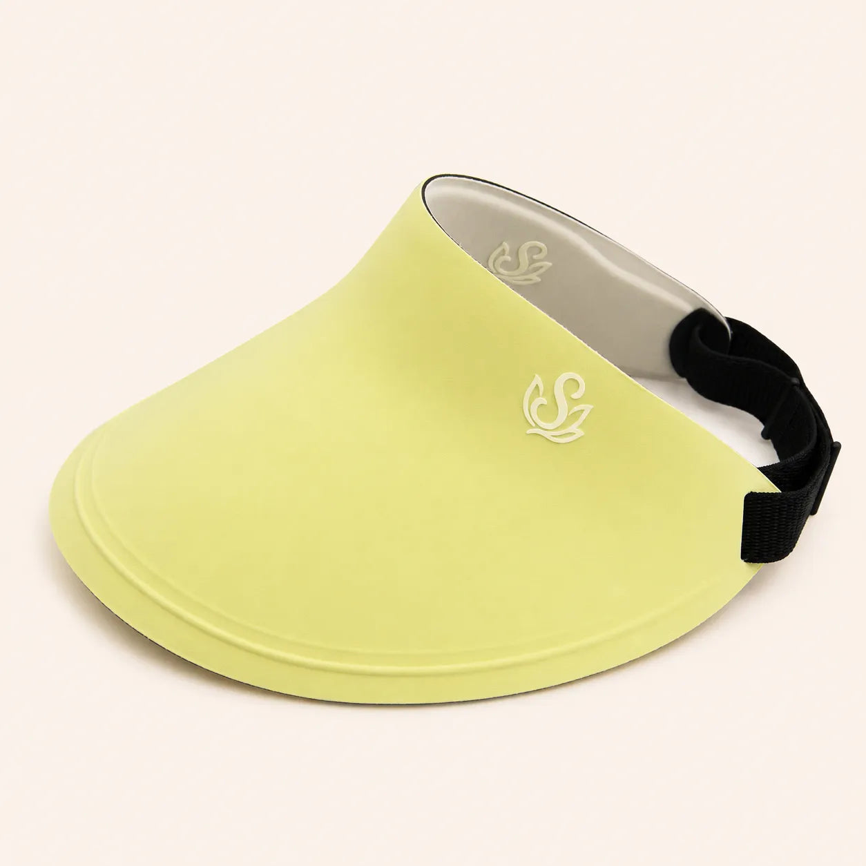 Lime Sportive Lives reversible sun visor with curved brim, logo detail, and adjustable black strap