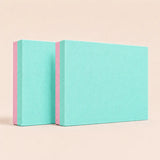 Mint green and pink Sportive Lives TPE yoga balance pad with textured high-density foam for yoga, stretching, balance training and home workouts.