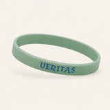 Mint green silicone wristband with blue VERITAS lettering