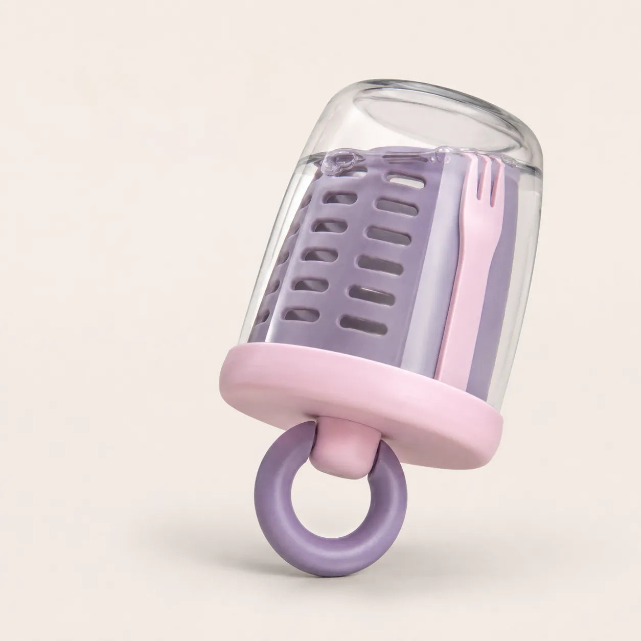Lavender and baby pink Sportive Lives Portable Salad Cup shown upside down with clear cup, draining basket, lid, and carry ring