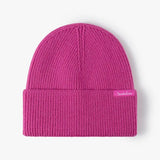 Fuchsia pink rib-knit cuffed beanie by Sportive Lives, cozy stretch acrylic blend, unisex one size 56–58 cm winter hat.