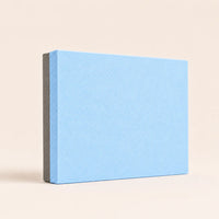 Light blue and gray TPE Yoga Balance Cushion Pad with textured surface for balance training and exercise