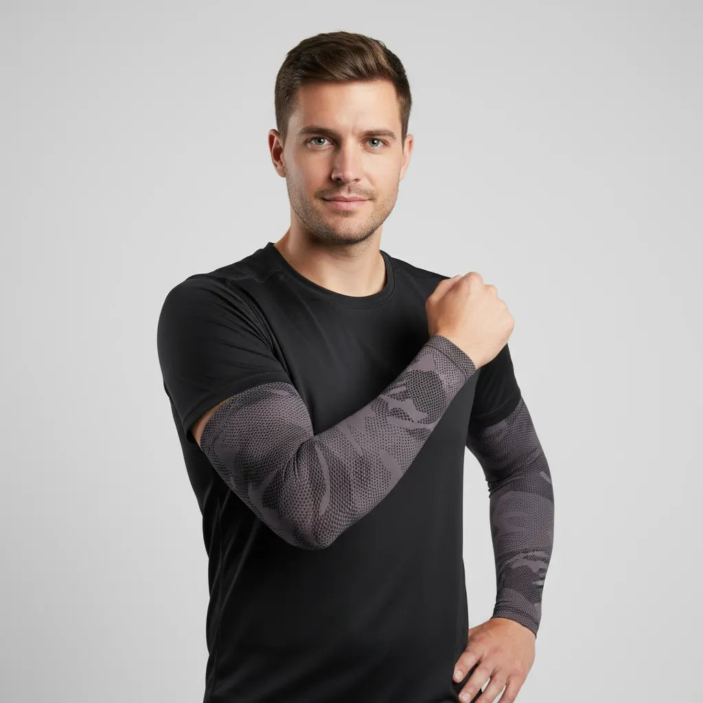Male model wearing charcoal camo UV arm sleeves — breathable, cooling sun sleeves with secure stay-put fit — Sportive Lives Canada